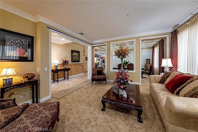 living area featuring visible vents, carpet flooring, baseboards, and ornamental molding