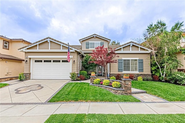 craftsman inspired home with concrete driveway, an attached garage, stone siding, and a front lawn