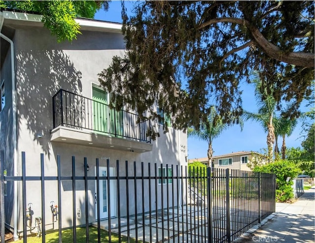 view of gate featuring fence