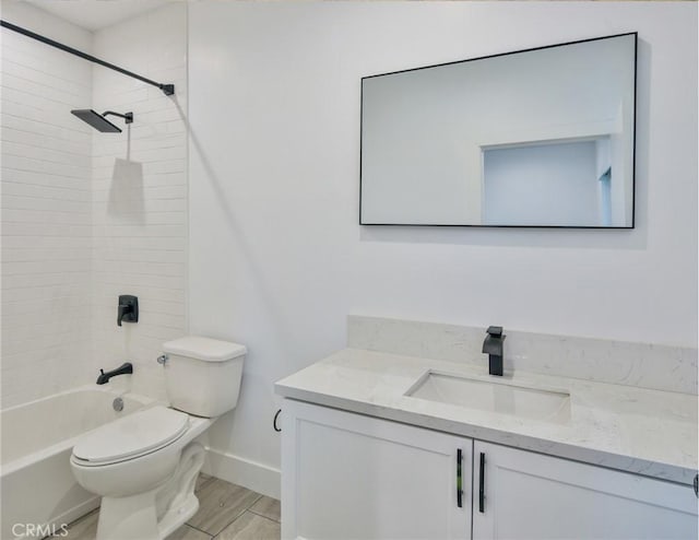 bathroom with wood finished floors, toilet, vanity, baseboards, and  shower combination
