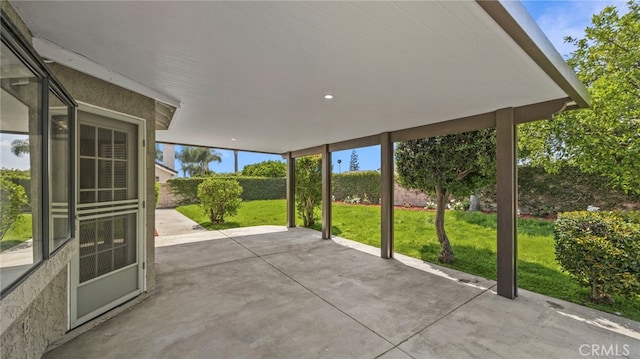 view of patio / terrace featuring fence