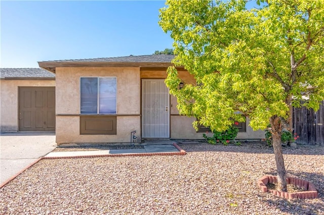 view of front of home with stucco siding
