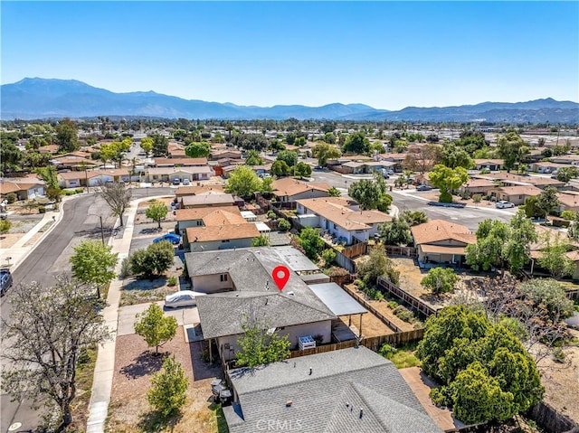 bird's eye view featuring a mountain view and a residential view