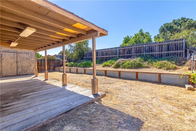 deck featuring a fenced backyard