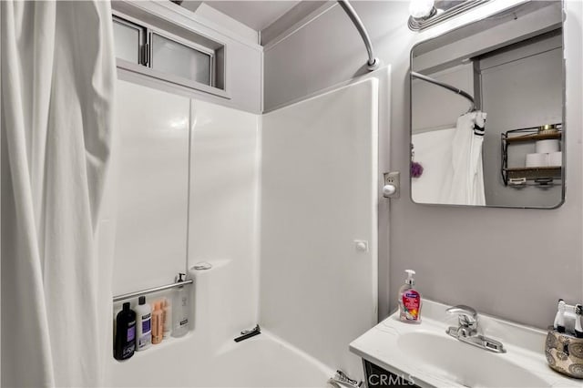 full bath with shower / bath combo with shower curtain and vanity