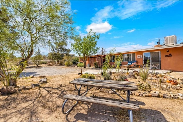 exterior space featuring cooling unit and a patio area