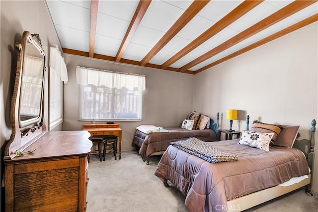 carpeted bedroom with vaulted ceiling