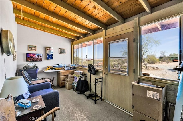 living area with wood ceiling, tile patterned floors, and beam ceiling