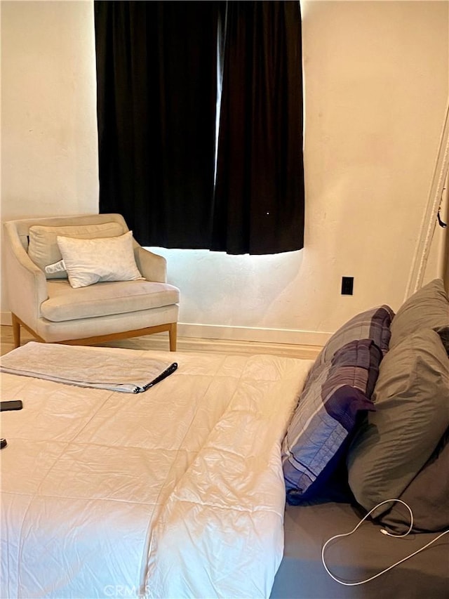bedroom with baseboards