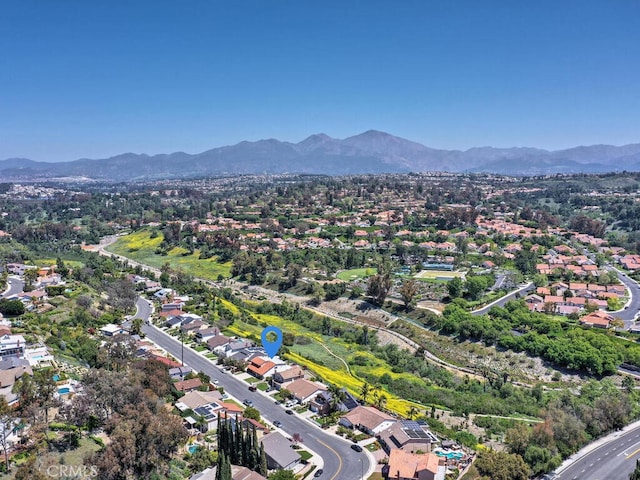 drone / aerial view with a mountain view and a residential view