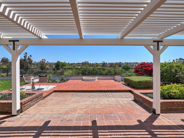 view of patio with fence and a pergola