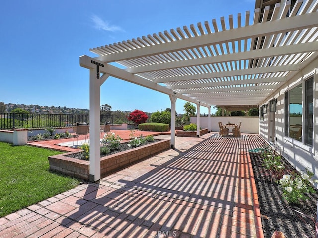 view of patio with fence and a pergola