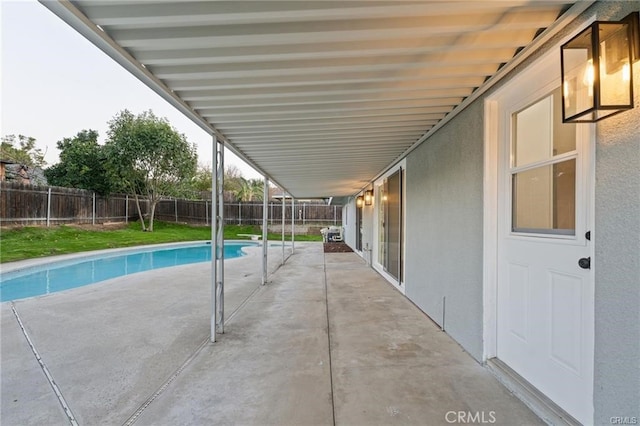 view of swimming pool with a fenced in pool, a patio area, and a fenced backyard