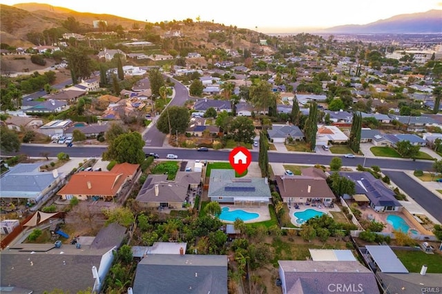 drone / aerial view with a mountain view and a residential view