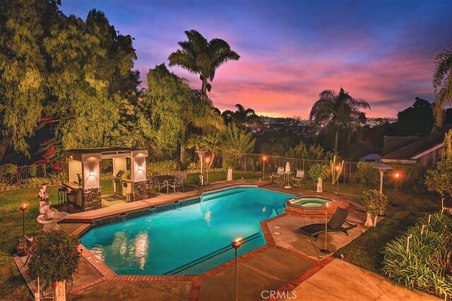 25641 Rapid Falls Rd, Laguna Hills, CA 92653 - pool at dusk with a patio and a pool with connected hot tub