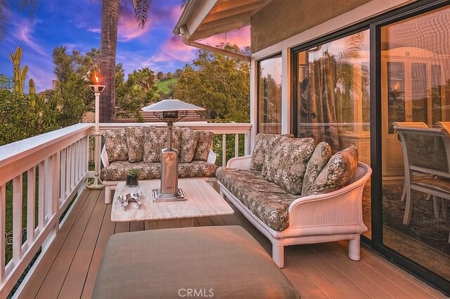 25641 Rapid Falls Rd, Laguna Hills, CA 92653 - wooden terrace with outdoor lounge area