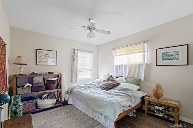 221 40th St, Manhattan Beach, CA 90266 - bedroom with wood finished floors, a ceiling fan, and baseboards