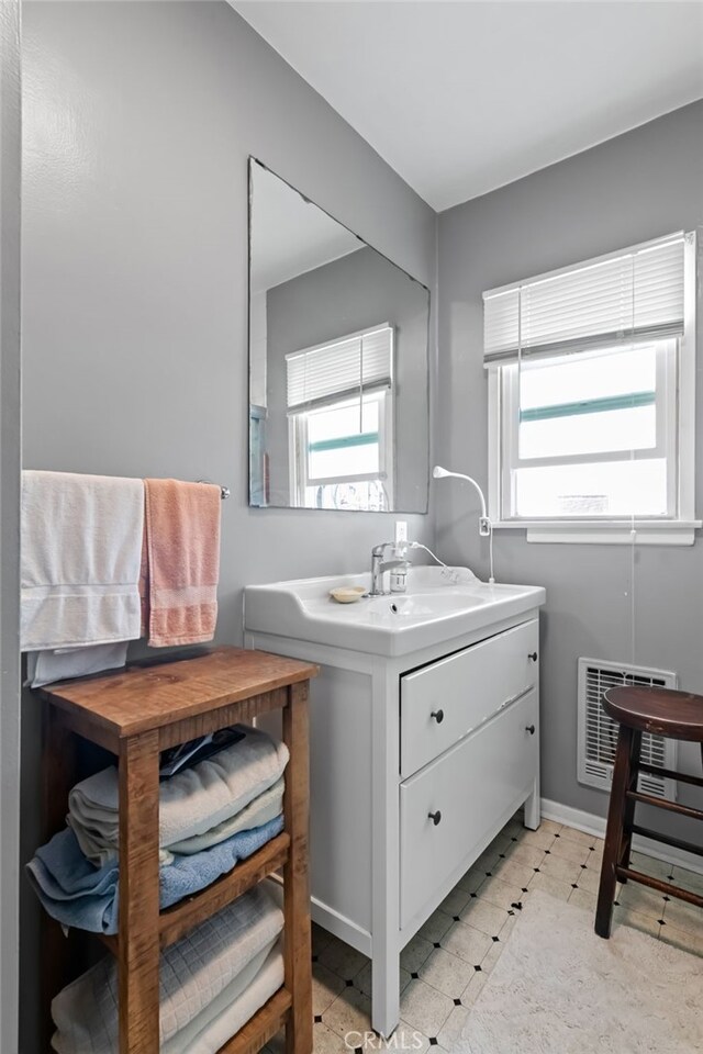 221 40th St, Manhattan Beach, CA 90266 - bathroom featuring vanity, tile patterned floors, visible vents, and plenty of natural light