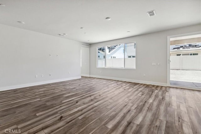 16669 Dara Ave, Chino, CA 91708 - unfurnished room with wood finished floors and baseboards
