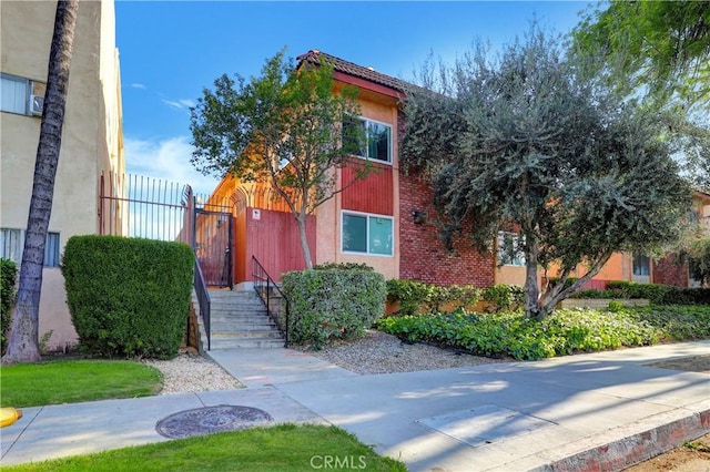 21900 Roscoe Blvd Unit 5, Canoga Park, CA 91304 - view of front of house with stucco siding