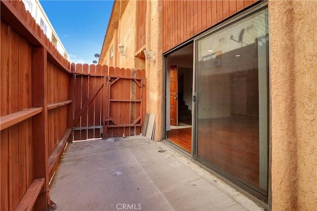 21900 Roscoe Blvd Unit 5, Canoga Park, CA 91304 - view of patio / terrace with fence and a gate