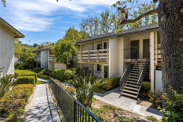 23732 Hillhurst Dr Unit 32, Laguna Niguel, CA 92677 - exterior space with stairway, fence, and stucco siding