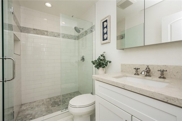 23732 Hillhurst Dr Unit 32, Laguna Niguel, CA 92677 - full bathroom featuring vanity, recessed lighting, a shower stall, and toilet