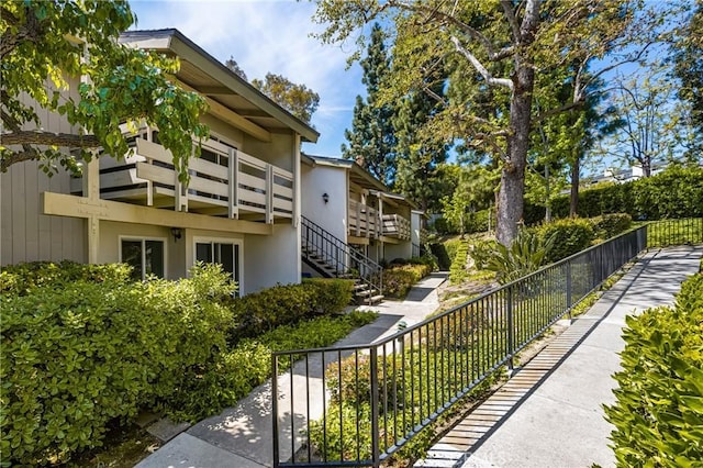23732 Hillhurst Dr Unit 32, Laguna Niguel, CA 92677 - view of property's community featuring stairway and fence