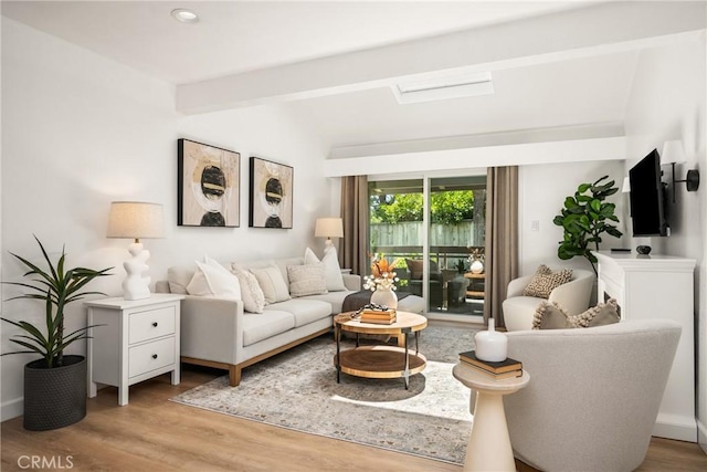 23732 Hillhurst Dr Unit 32, Laguna Niguel, CA 92677 - living room with vaulted ceiling with beams, wood finished floors, and recessed lighting