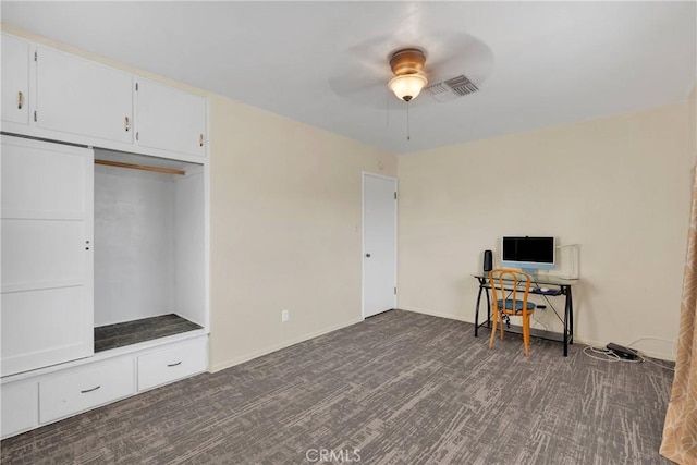 312 W Lugonia Ave, Redlands, CA 92374 - home office featuring a ceiling fan, dark carpet, and baseboards