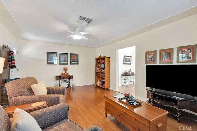 312 W Lugonia Ave, Redlands, CA 92374 - living area featuring a ceiling fan and wood finished floors