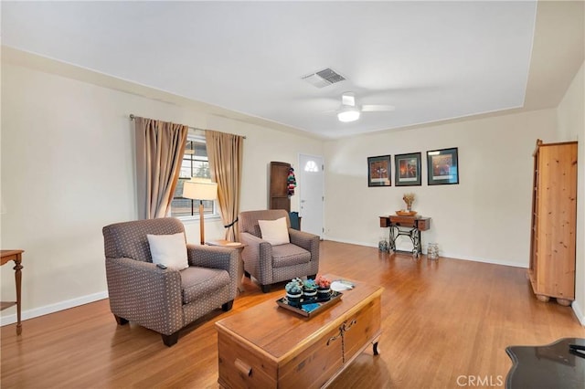 312 W Lugonia Ave, Redlands, CA 92374 - living room featuring light wood-style flooring, baseboards, and ceiling fan