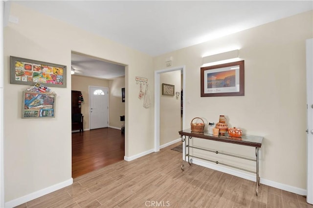 312 W Lugonia Ave, Redlands, CA 92374 - hallway with light wood finished floors and baseboards