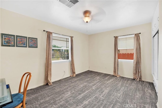 312 W Lugonia Ave, Redlands, CA 92374 - unfurnished office with carpet flooring, a ceiling fan, and baseboards
