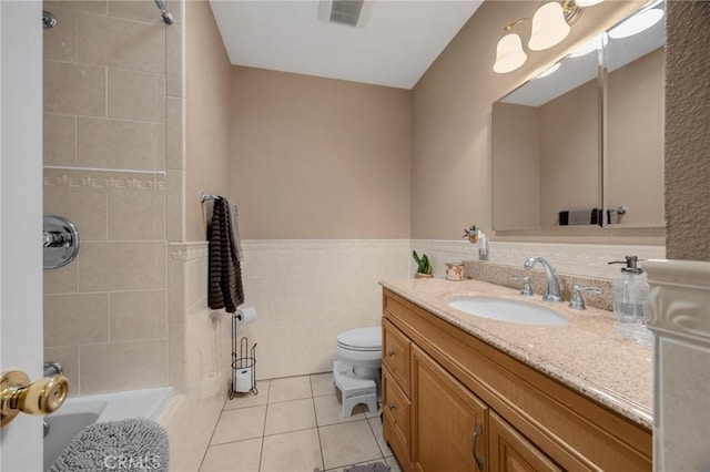 17381 Yorkshire Ave, Yorba Linda, CA 92886 - full bathroom featuring visible vents, toilet, tile walls, vanity, and tile patterned flooring