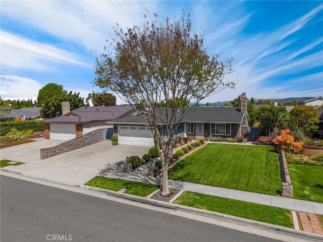 17381 Yorkshire Ave, Yorba Linda, CA 92886 - single story home with a garage, a chimney, a front yard, and concrete driveway