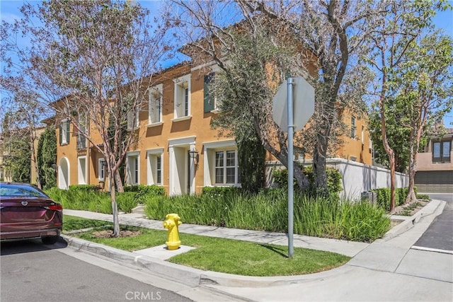 view of front of property featuring stucco siding
