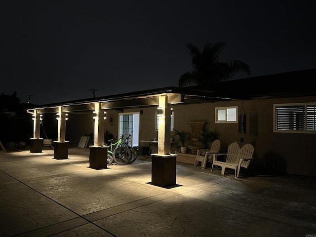view of patio at twilight