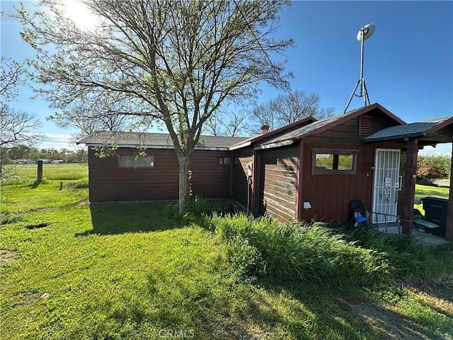 23271 Olive Ave, Gerber, CA 96035 - view of side of home with a yard
