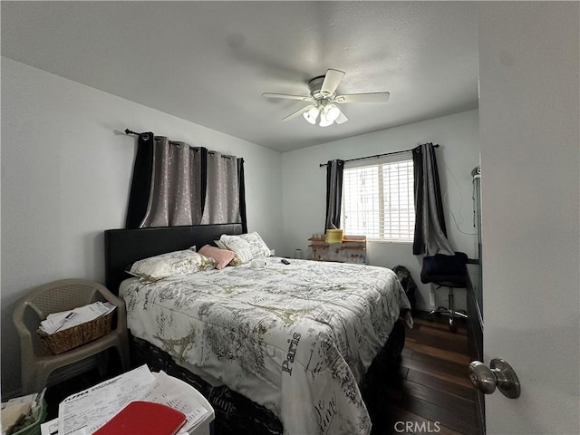 323 E 107th St, Los Angeles, CA 90003 - bedroom featuring ceiling fan and wood finished floors