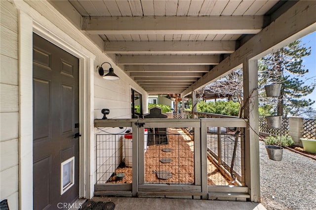 view of patio featuring a gate