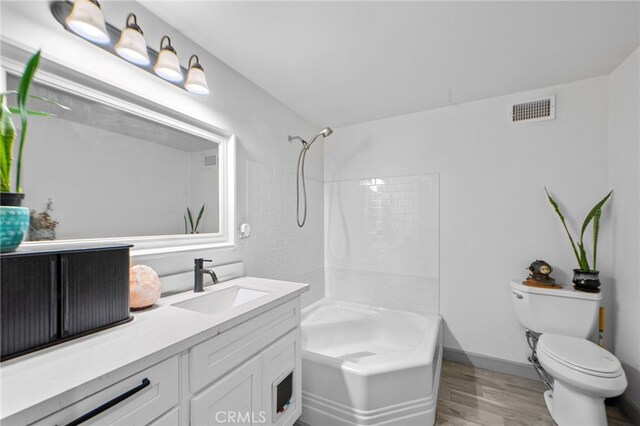 26429 Apache Trl, Rimforest, CA 92378 - full bath with shower / tub combination, wood finished floors, and vanity
