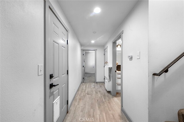 26429 Apache Trl, Rimforest, CA 92378 - corridor featuring recessed lighting, light wood-style flooring, and stairs