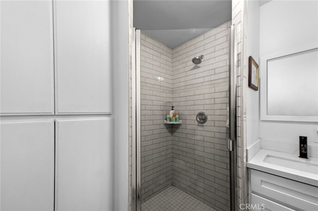 full bathroom featuring vanity and a stall shower