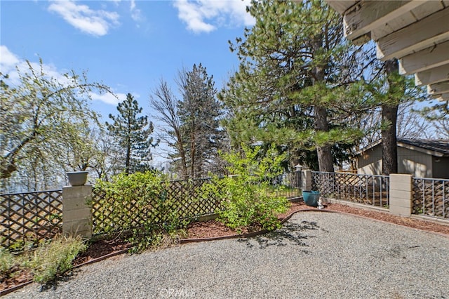 view of yard with fence