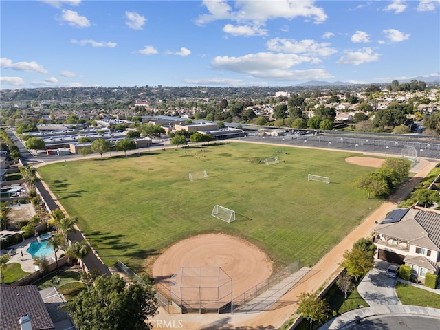 birds eye view of property with a residential view