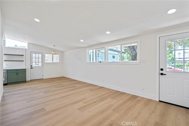 3881 Manchester Pl, Riverside, CA 92503 - foyer entrance with recessed lighting, baseboards, vaulted ceiling, and light wood-type flooring
