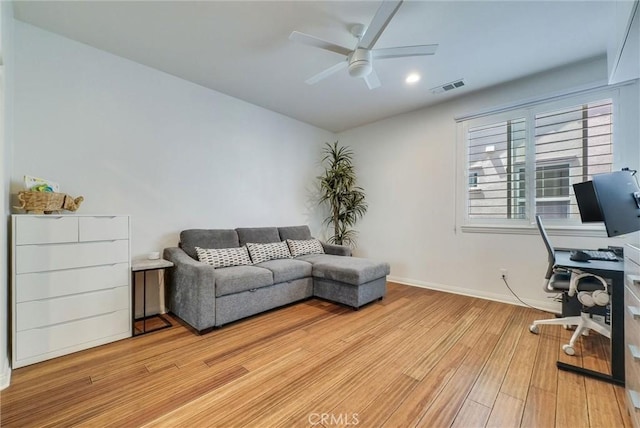 11927 Bunting Cir, Corona, CA 92883 - home office featuring light wood-style floors, a ceiling fan, and recessed lighting