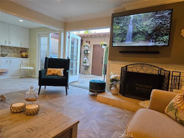living room with recessed lighting and ornamental molding