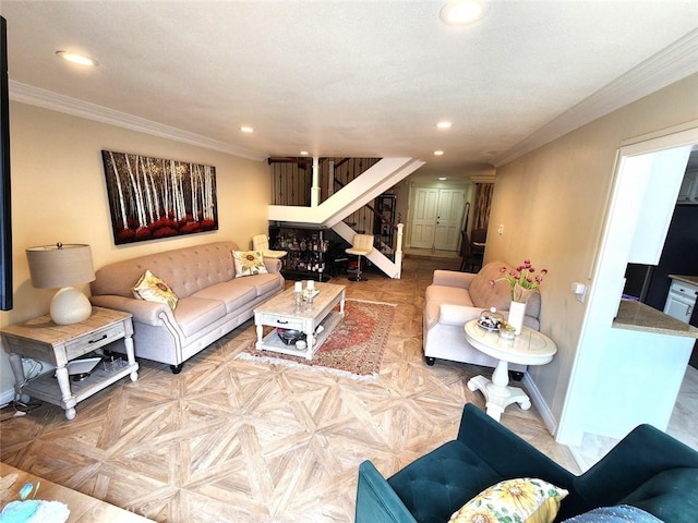 living area with baseboards, recessed lighting, stairs, and ornamental molding